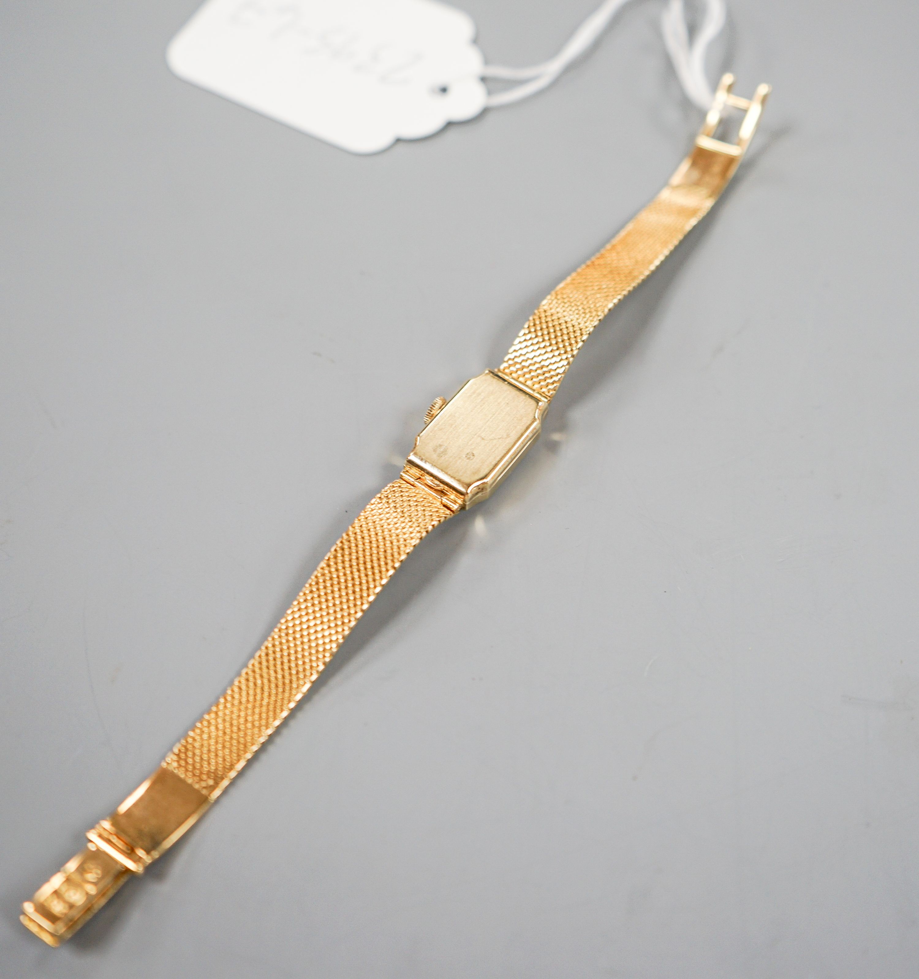A lady's 18ct gold, ruby and diamond set Gubelin manual wind cocktail watch